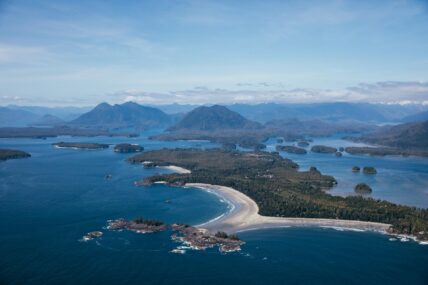 Scenic coastal mountains and forest meeting the waters of Clayoquot Sound