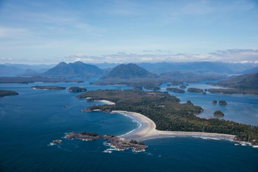 Scenic coastal mountains and forest meeting the waters of Clayoquot Sound