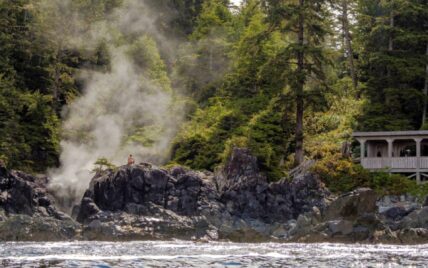 Remote Hot Springs Cove in Tofino with steam rising through the lush coastal rainforest