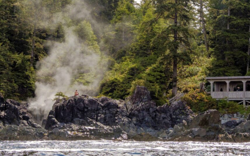 Remote Hot Springs Cove in Tofino with steam rising through the lush coastal rainforest