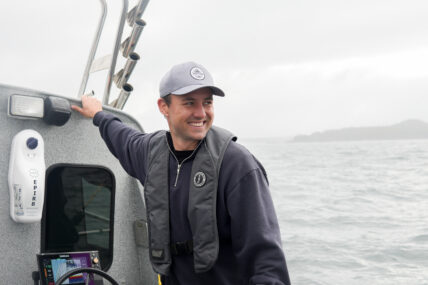 Our fishing guide smiling on one of our fishing boats
