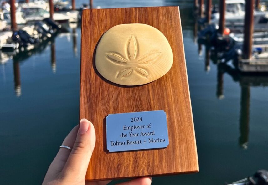 Award plaque with sand dollar that says